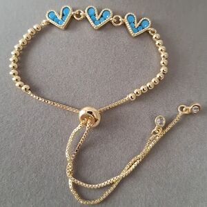 Turquoise hearts Ajustable bracelet .